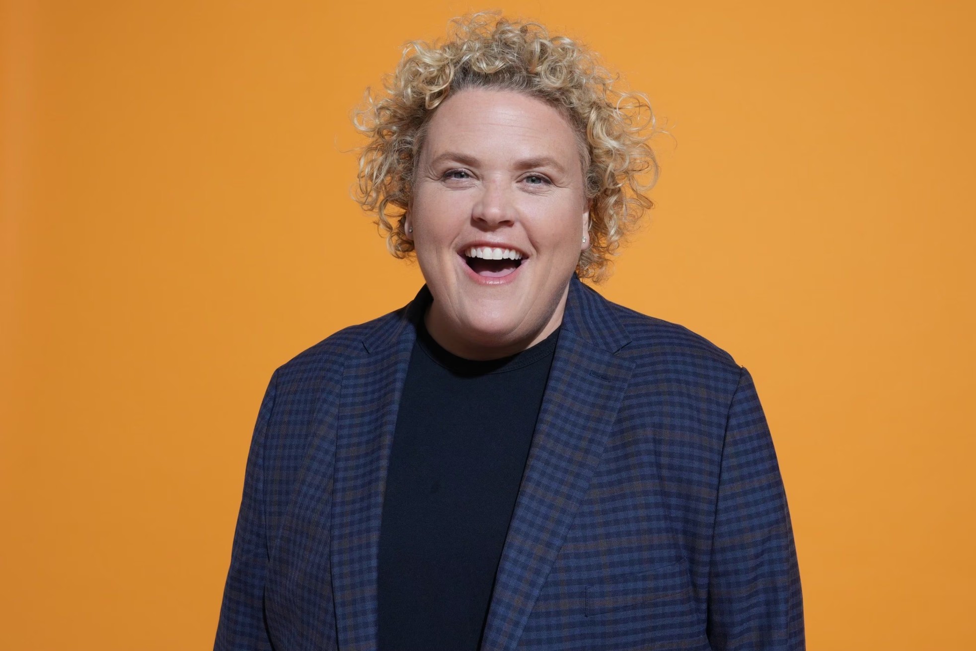 How tall is Fortune Feimster?